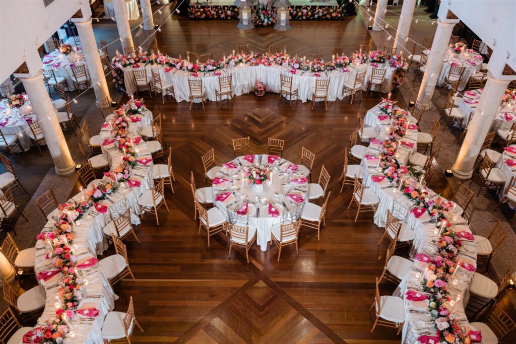Thoughtful wedding guest experience with serpentine tables